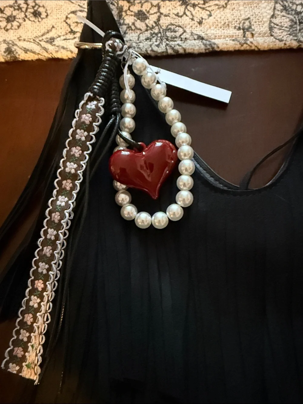 Madden NYC Black Fringe Hobo Bag with Pearl & Heart Charm
